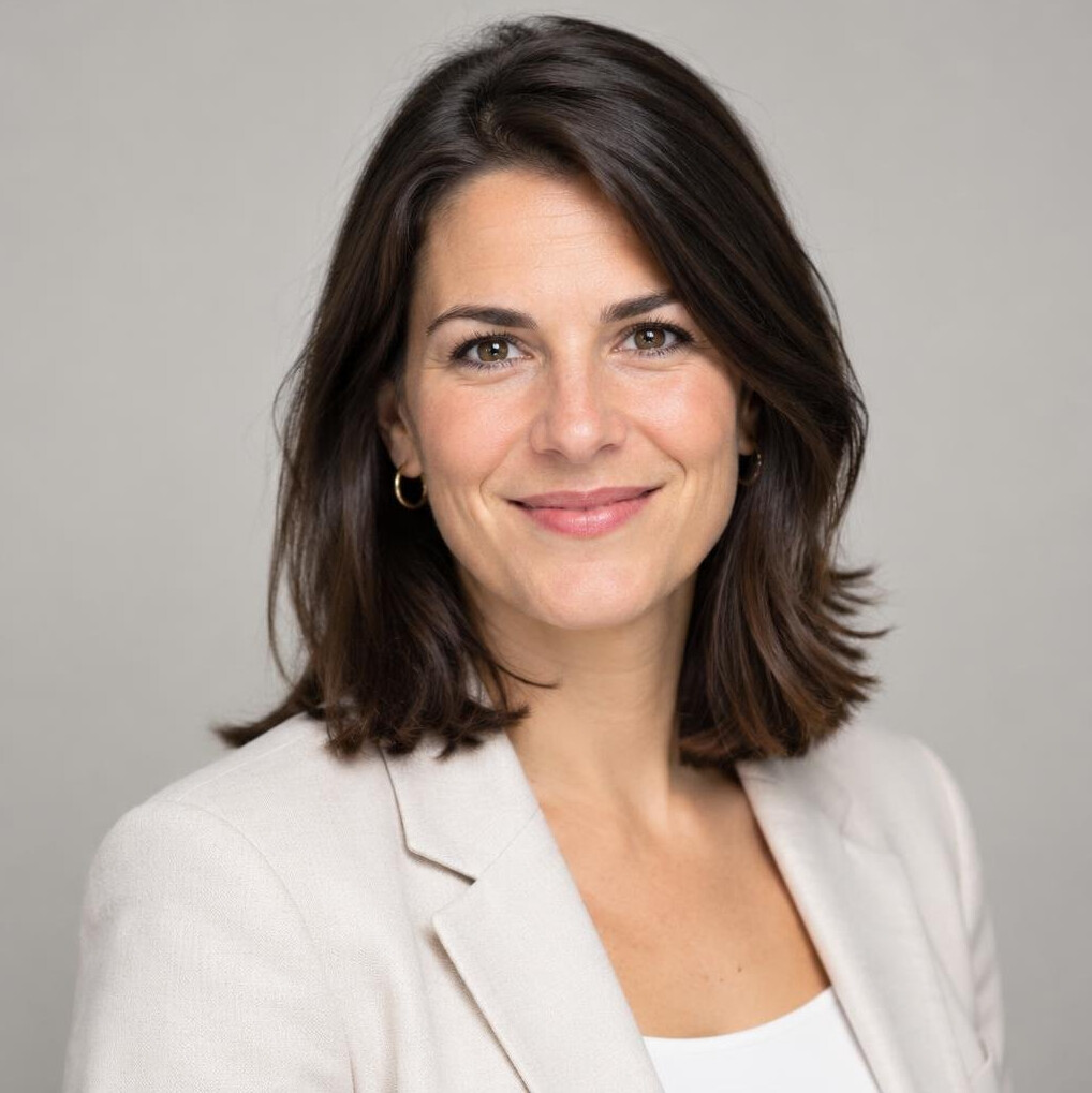 Portrait of a smiling woman with long dark hair